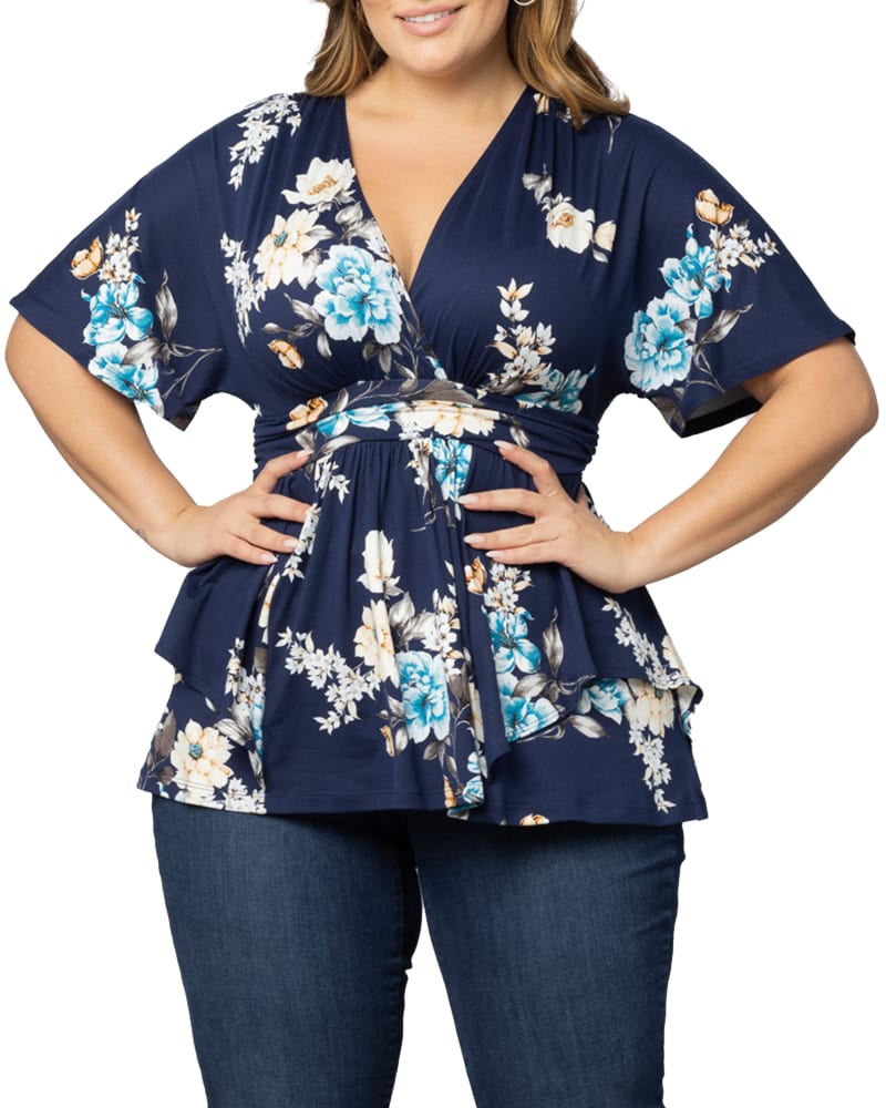 Front of a model wearing a size 5X Encore Print Top in NAVY FLORAL PRINT by Kiyonna. | dia_product_style_image_id:353002